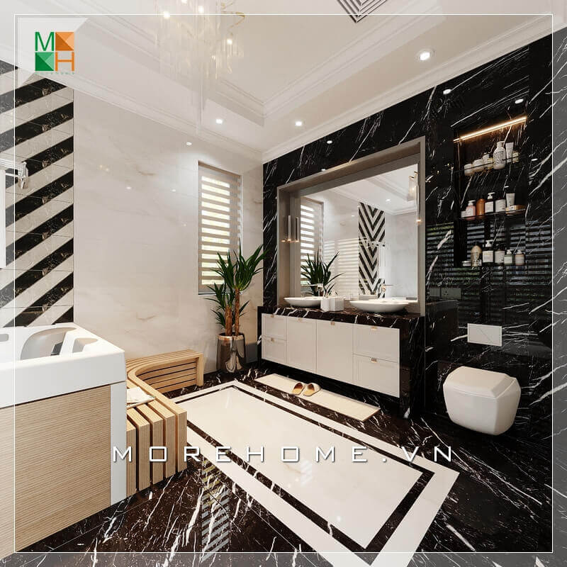 Sử dụng gạch lát nền màu đen và gạch ốp tường vân đá, sự kết hợp hài hòa giữa hai màu khiến căn phòng tắm trở nên sáng và rất sang trọng. Thiết kế phòng tắm biệt thự
