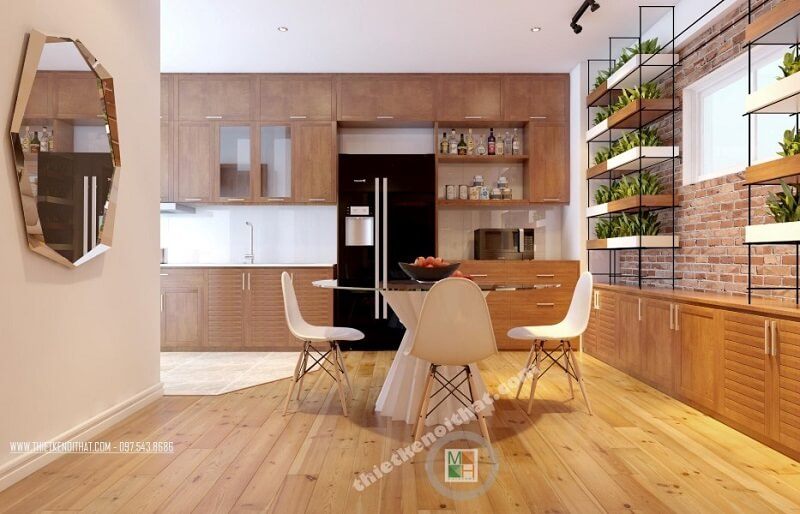 Mẫu thiết kế phòng ăn chung cư hiện đại với bộ bàn ăn đơn giản nhỏ gọn kết hợp hệ tủ bếp gỗ công nghiệp cao cấp mang đến không gian phòng ăn lí tưởng